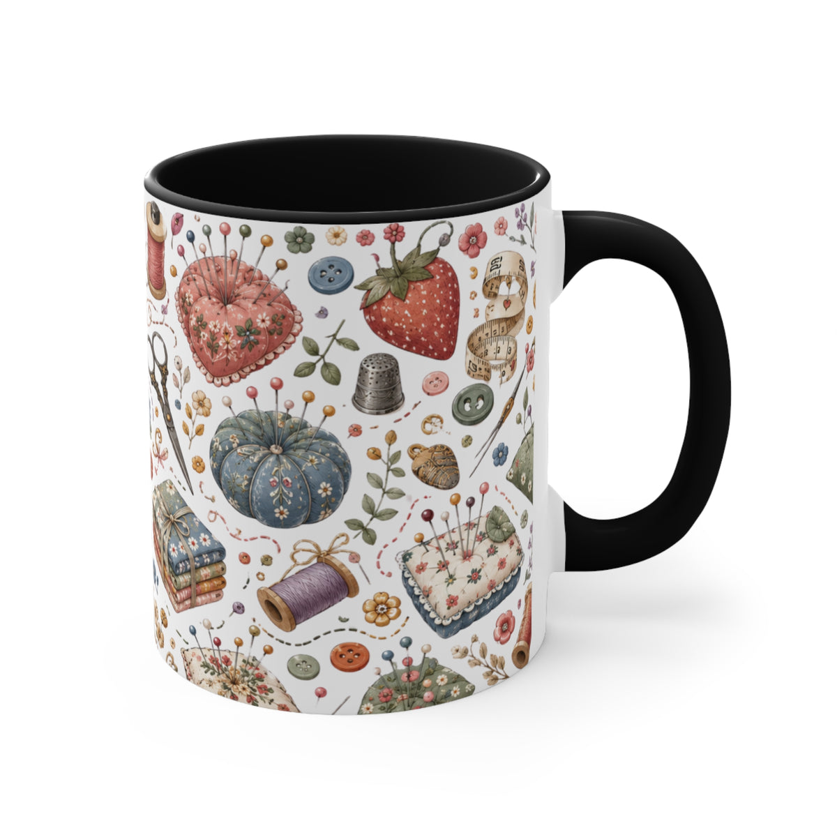 A white ceramic mug with a black interior, decorated with vintage-style sewing and craft illustrations, including  pincushions, scissors, and thread spools, with a black handle and interior.