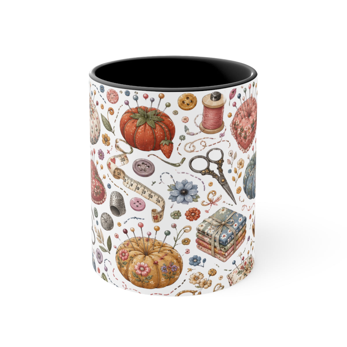 A white ceramic mug with a black interior, decorated with vintage-style sewing and craft illustrations, including  pincushions, scissors, and thread spools, with a black handle and interior.
