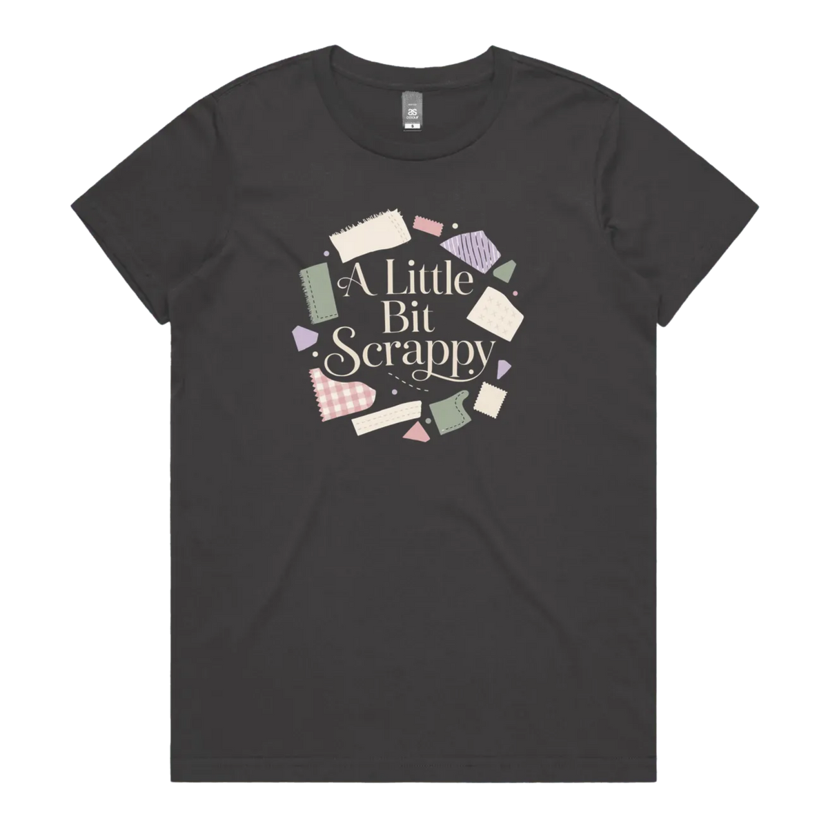 A dark grey short-sleeve crewneck t-shirt featuring a circular graphic on the chest with the text 'A Little Bit Scrappy' surrounded by small colorful fabric pieces.