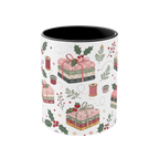 The front of a white ceramic mug with a black interior, decorated with a repeating pattern of stacked fabrics, holly leaves, berries, and thread spools in soft pink, green, beige, and brown tones.