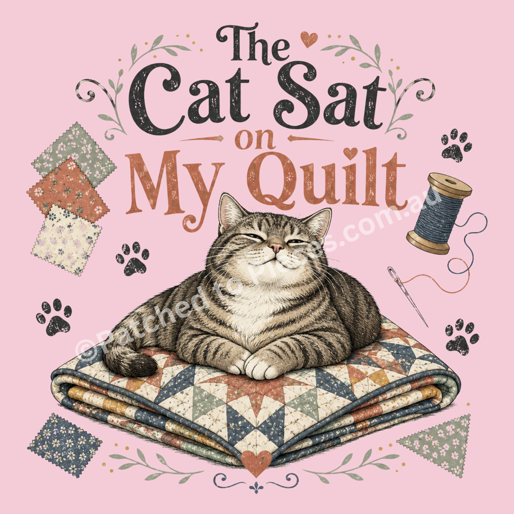 An illustration of a tabby cat lying on a patterned quilt, with the text 'The Cat Sat on My Quilt' above it. The design includes sewing-themed elements like a spool of thread, a needle, paw prints, and fabric swatches on a solid pink background.