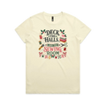 A pale butter yellow short-sleeve crewneck t-shirt featuring a colorful graphic print on the front with sewing-themed illustrations and the text 'Deck the Halls and the Sewing Room'.