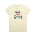 A pale butter yellow graphic short-sleeve t-shirt with the words 'I Speak Fluent Pantrograph' surrounded by thread spools, bobbins, a needle and swirling stitche lines in multi colours.
