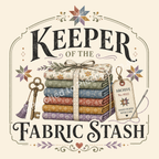 A detailed image of the graphic 'Keeper of the Fabric Stash' in muted greens, blues, tan, blue and mauve. A stack of folded fabric is in the middle, tied with a measuring tape. A key is on the left with an archive tag on the right with small stars, flowers and a heart as accents.