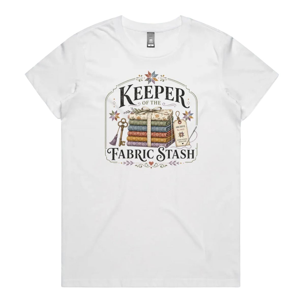 A white crewneck, short-sleeved t-shirt with the vintage style graphic 'Keeper of the Fabric Stash'.