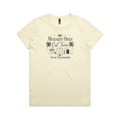 A pale butter yellow short-sleeve crewneck t-shirt with the graphic 'Measure Once, Cut Twice, Swear Occasionally'. The design includes patchwork stars and quilting accessories.