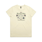 A pale butter yellow short-sleeve crewneck t-shirt with the graphic 'Measure Once, Cut Twice, Swear Occasionally'. The design includes patchwork stars and quilting accessories.