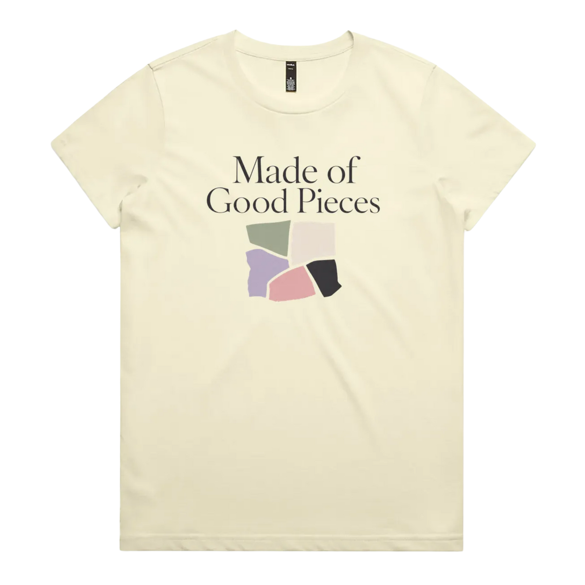 A very pale yellow short-sleeve t-shirt with the text 'Made of Good Pieces' above an image of uneven fabric swatches in sage, cream, mauve pink and black.