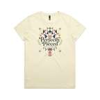 A pale butter yellow graphic short-sleeve t-shirt with the words 'Perfectly Pieced Modern Quilt Guild' cutting through a large patchwork star.