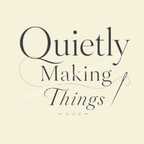 A square graphic with the phrase 'Quietly Making Things' in dark gray serif and script lettering on a pale butter yellow background, with a thin pink decorative line and a small needle illustration.