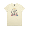 A pale butter yellow short-sleeve t-shirt with a graphic print on the front that reads 'Queen of the Quilt Frame' in black script, decorated with a gold crown, a quilt design, and spools of thread.