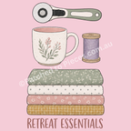 A flat-lay style illustration on a pink background showing sewing/craft essentials: a rotary cutter, a floral mug, a spool of lavender thread, a stack of four folded fabrics, and the text 'RETREAT ESSENTIALS' at the bottom.