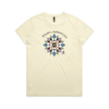 A pale butter yellow short-sleeve crewneck tshirt with the words 'Scrappy but Sophisticated' above a large star quilt block with a purple thread spool on the bottom right.