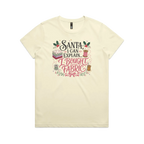 A pale butter yellow short-sleeve crewneck t-shirt with a festive Christmas-themed graphic on the chest. The graphic features the text 'Santa, I Can Explain...I Bought Fabric'.