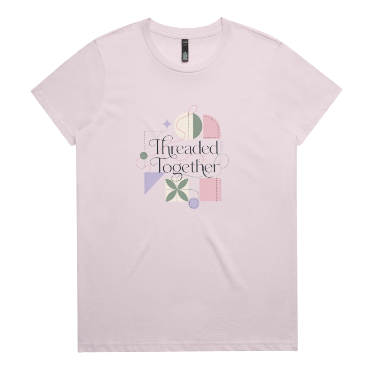 A pale mauve short-sleeve crewneck t-shirt featuring a central graphic with the words 'Threaded Together' in black script, surrounded by pastel geometric shapes in pink, purple, green, and beige.