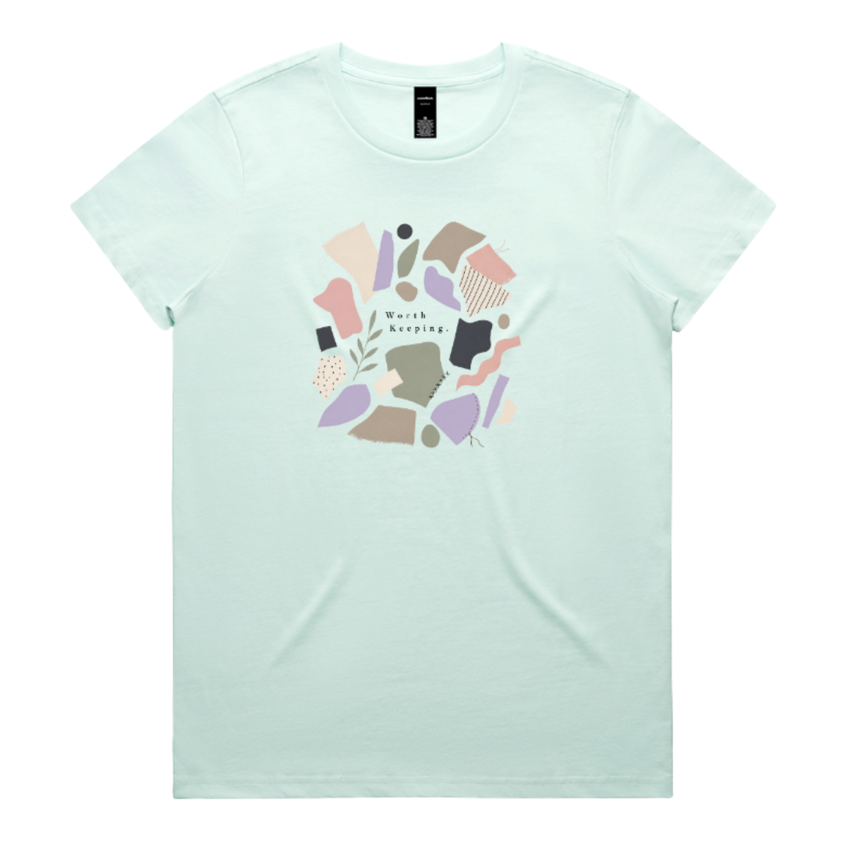 A light mint green crewneck t-shirt featuring a central graphic of abstract pastel shapes in pink, purple, beige, and brown, with the text 'Worth Keeping' written in the center.